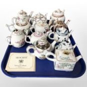 A group of Victoria and Albert Museum reproduction porcelain teapots with certificates.