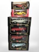 Four boxed Burago 1:18 scale die-cast vehicles and two further 1:24 scale cars.