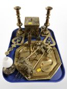 A pair of brass candlesticks, folding easel stand, octagonal tray, tea caddy, trivets etc.