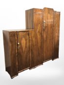 A 1950's burr walnut single door wardrobe,