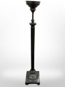 An early 20th century patinated metal smoker's stand,