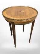 A French king wood veneered gilt metal mounted circular occasional table, height 57cm.