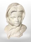 An early-20th century continental plaster bust of a girl in headscarf, height 37cm.