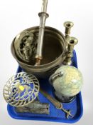 A brass planter, pair of candlesticks, trivet, cast-iron door knocker in the form of a woodpecker,