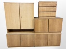 Five various Danish oak veneered cabinets,