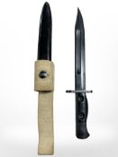 A British Military bayonet L1A3 knife bayonet with scabbard, 20cm Bowie blade stamped '67 Enfield',