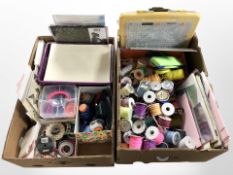 A large quantity of spools of thread, craft paper, and related items.
