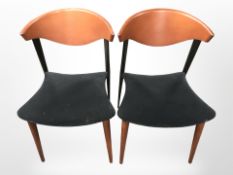 A contemporary set of six Danish teak veneered and ebonised dining chairs.