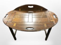 An oak butler's tray table, width 70cm.