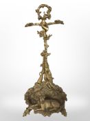 A 19th-century painted cast-iron umbrella stand of naturalistic form, surmounted by a gun dog,