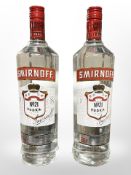 Two 1L bottles of Smirnoff No21 vodka.