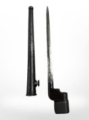 A British Military bayonet No 4 Mk I cruciform blade spike bayonet with scabbard,