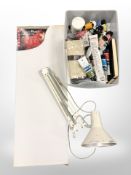 An angle poise lamp, a daler board and a box of assorted artists paints, palette knives, etc.