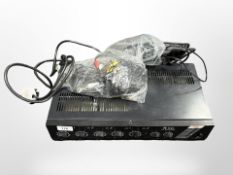 A TOA PA amplifier A-30E with a quantity of leads.