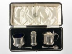 A George V silver five-piece cruet set, Reid & Sons, Birmingham 1934.
