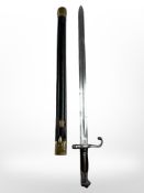 An Italian M 1870 Vetterli sword bayonet with brass-mounted leather scabbard,