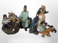 Four Chinese earthenware figures,