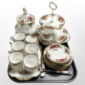 A Royal Albert Old Country Roses 21 piece tea service, together with rectangular shallow tray,