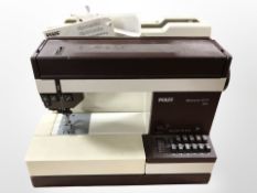 A Pfaff Tiptronic 1071 electric sewing machine with pedal and lead (continental plug).