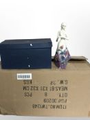 Eight Old Tupton Ware pottery figures of ladies in floral dresses, height 26cm, all boxed.