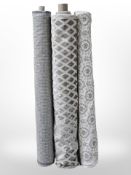 Three part rolls of upholsterer's fabric, approximate width 150cm, lengths unknown.