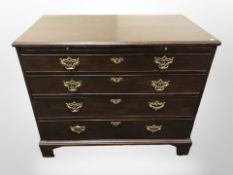 A George III mahogany and oak four drawer chest,