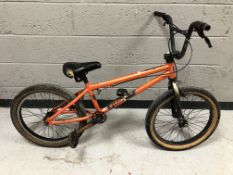 A child's Mongoose bike, 10