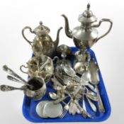 Assorted silver plated wares including three-piece tea service, further coffee pot, cutlery,