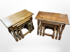A reproduction oak nest of three tables