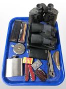 A pair of Sagan 7x50 binoculars, further pair of 8x42 binoculars, hip flasks, pens, folding knife,