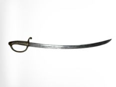 A French M 1804 Naval cutlass, with ribbed brass grip, blade 67cm long.