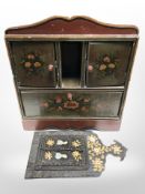 A painted folk art cabinet, width 33cm, and a small painted mirror with shutter doors.