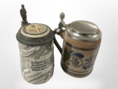 An agate ware stein with pewter lid and German script to front, and a further stein, tallest 18cm.