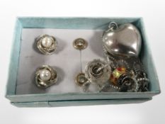 A pair of 9ct gold earrings set with white stones, a pair of silver and pearl earrings,