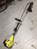 A Ryobi petrol strimmer