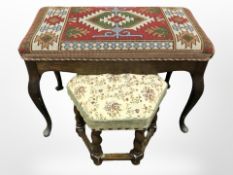 An oak and needlework stool on cabriole legs, width 74cm, and a hexagonal barley twist stool.