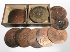 An early-20th century disc music player, width 17cm.