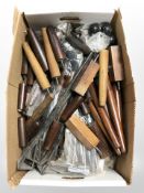 A large quantity of 20th-century Danish mainly teak furniture legs, casters, table legs, etc.