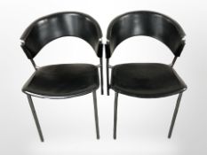 A pair of contemporary chrome and stitched vinyl chairs