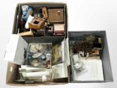 A collection of doll's house furniture and decorations.