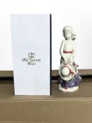 18 matching Old Tupton Ware pottery figures of girls in floral dresses, height 20.5cm, all boxed.