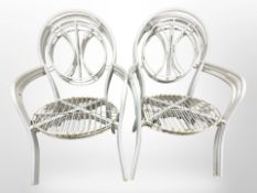 A set of six painted metal garden chairs