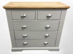A modern oak and MDF painted five drawer chest, 96cm x 42cm x 91cm.