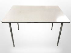A 20th century Scandinavian melamine topped kitchen table on tapering metal, 110cm x 70cm x 74cm.