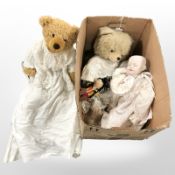 Two jointed teddy bears, a Pinocchio puppet and a porcelain headed doll.
