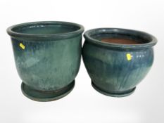 Two turquoise-glazed terracotta plant pots, tallest 32cm.