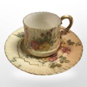 A Royal Worcester blush ivory tea cup and saucer, pattern 1682.