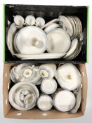 A large quantity of KPM blue and gilt-rimmed tea and dinner wares.