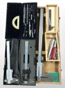 A group of precision calipers, drawing instruments, etc.