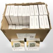 A quantity of air quality CO2 monitors, all boxed.